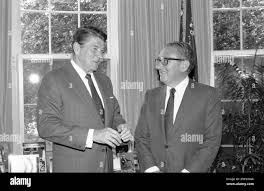 U.S. President Ronald Reagan talks with former Secretary of State Henry  Kissinger in the Oval Office of the White House, Tuesday, Sept. 25, 1984 in  Washington. The two met and discussed the