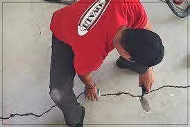 repair garage floor s and pitting