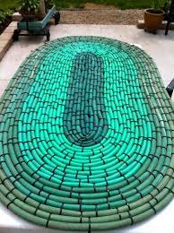Recycled Hoses Into Garden Mat