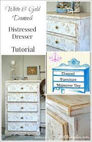 white and gold distressed damask dresser