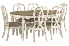 While you're browsing our trendy selection of farmhouse dining tables and sets, use our filter options to discover all the dining tables and sets colors, sizes, materials, styles, and more we have to offer. Realyn Dining Table And 6 Chairs Set Ashley Furniture Homestore