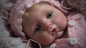 an extremely cute image of a baby doll