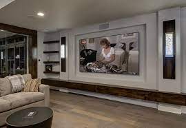 Idea For Tv Wall With Sconces And Wood