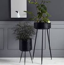 Tall potted plants help to give a focal point to a container garden. Best Indoor Plant Pot Stands Plant Stands Planter On Legs