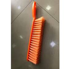 plastic orange carpet cleaning brushes
