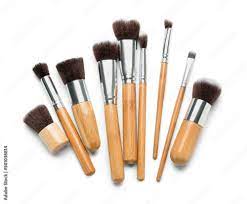 set of new makeup brushes on white