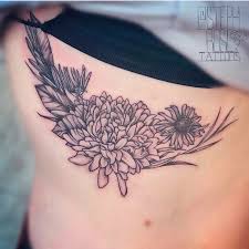 ribcage flower tattoo by stephanie
