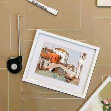 How To Easily Hang Multiple Picture Frames