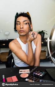 male makeup artist stock photos