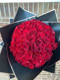5 dozen red rose bouquet in grand