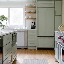 Sage green kitchen (benchmarx range) with treated oak work surface and belfast sink. Sage Green Kitchen Cabinets Design Ideas