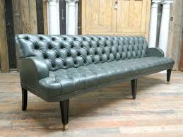 deep oned green leather sofa