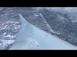 american eagle crj 700 snowy landing at