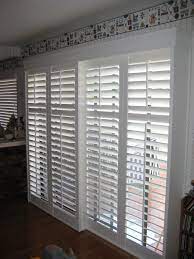 sliding patio door with blinds and