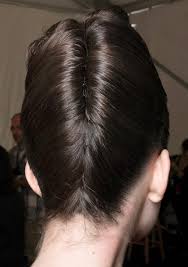 Keep your french twist modern by letting the imperfections fall and letting your natural texture take its course. The 90s French Twist Is Back Thefashionspot
