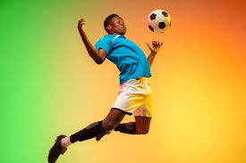 high jumping male soccer football