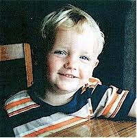 Juan James Qualtrough, son of Juan Henry and. Kim (Adams) Qualtrough of Fistard, Rushen, Isle of Man. Juan is age 3 in this photo taken in 2001. - john-james015_med