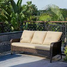 bwood brown wicker outdoor patio sofa couch with beige cushions