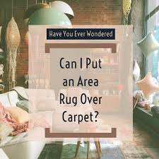 can i put an area rug over carpet