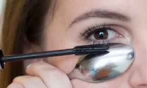 use a spoon as a mascara shield