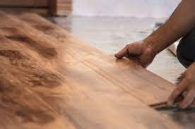 how to lay laminate flooring over an