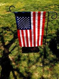 flag stand s by bald eagle flag