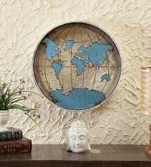 metal round world map in blue wall