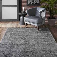gray indoor solid throw rug in the rugs