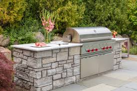 designing outdoor kitchens with natural