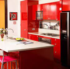 The red stools are very unusual and they give the room a really unique appeal. 15 Extremely Hot Red Kitchen Cabinets Home Design Lover