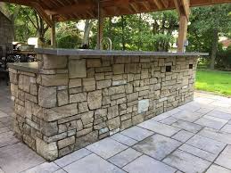 thin stone veneer outdoor kitchen