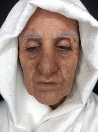 makeup student creates realistic old
