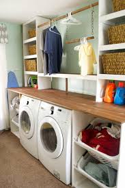 These simple box shelves work equally well in a formal setting and a utilitarian room, like the laundry or garage. Remodelaholic Built In Laundry Unit With Shelving