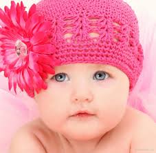 Cute American Baby Girl In Pink Woolen Cap