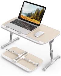 This makes the use of your mouse on this product easy while operating your laptop. Abovetek Laptop Desk For Bed Portable Table Tray With Foldable Legs Height Adjustable Notebook Computer Stand For Reading Writing On Bed Couch Sofa Floor Buy Online In Botswana At Botswana Desertcart Com Productid