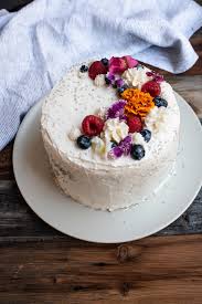white wedding cake frosting the