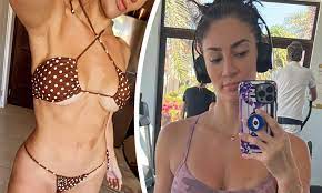 Sophie Brussaux smolders as she shows off her bikini body and hits the gym  in new Instagram snaps 