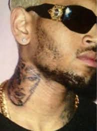 Earlier this week rihanna got a new tattoo of the egyptian goddess isis in memory of her late grandmother dolly who passed away a few months ago. Chris Brown Neck Tattoo Of Rihanna S Face Photo The Christian Post