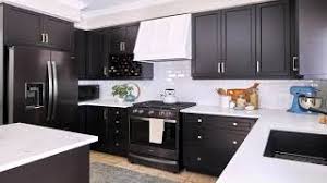 I prefer a kitchen with steel work surfaces everywhere, including the stove. White Kitchen Cabinets With Black Stainless Steel Appliances Youtube
