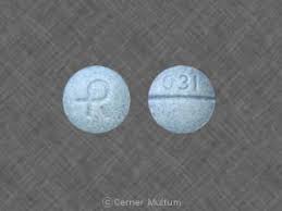 It's light blue, like a xanax, however, this says nothing on the back side, no score markings anywhere and just has a c at the. 031 R Pill Images Blue Round