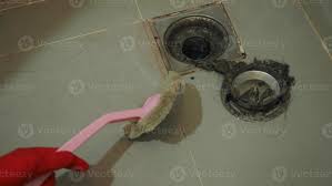 dirty sewer pipes floor drain full