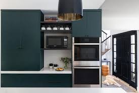 white kitchen with green tiles design ideas
