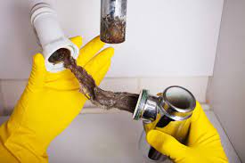 how to clear a stubborn clogged drain