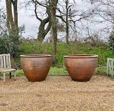 very large earthenware planters
