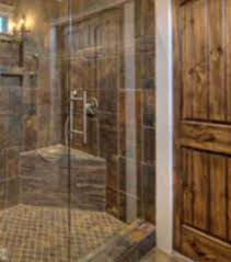 When a bathroom wall features peach and brown tiles, wall color options depend on the shade and undertone, or underlying hue, of the brown tile. Shower Floor Tile The Tile Shop