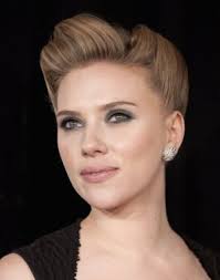 The rumored man-eater, 27, is reportedly snuggling up to New York advertising executive Nate Naylor, 38, on the heels of her split from actor Sean Penn. - Scarlett-Johansson-Dating-Nate-Naylor