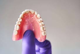 the proper use of denture adhesive