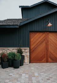 Wood Garage Doors And Copper Exterior
