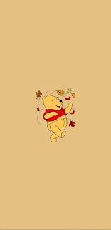 the pooh with leaves wallpaper