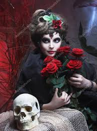 woman with roses and skull stock photo